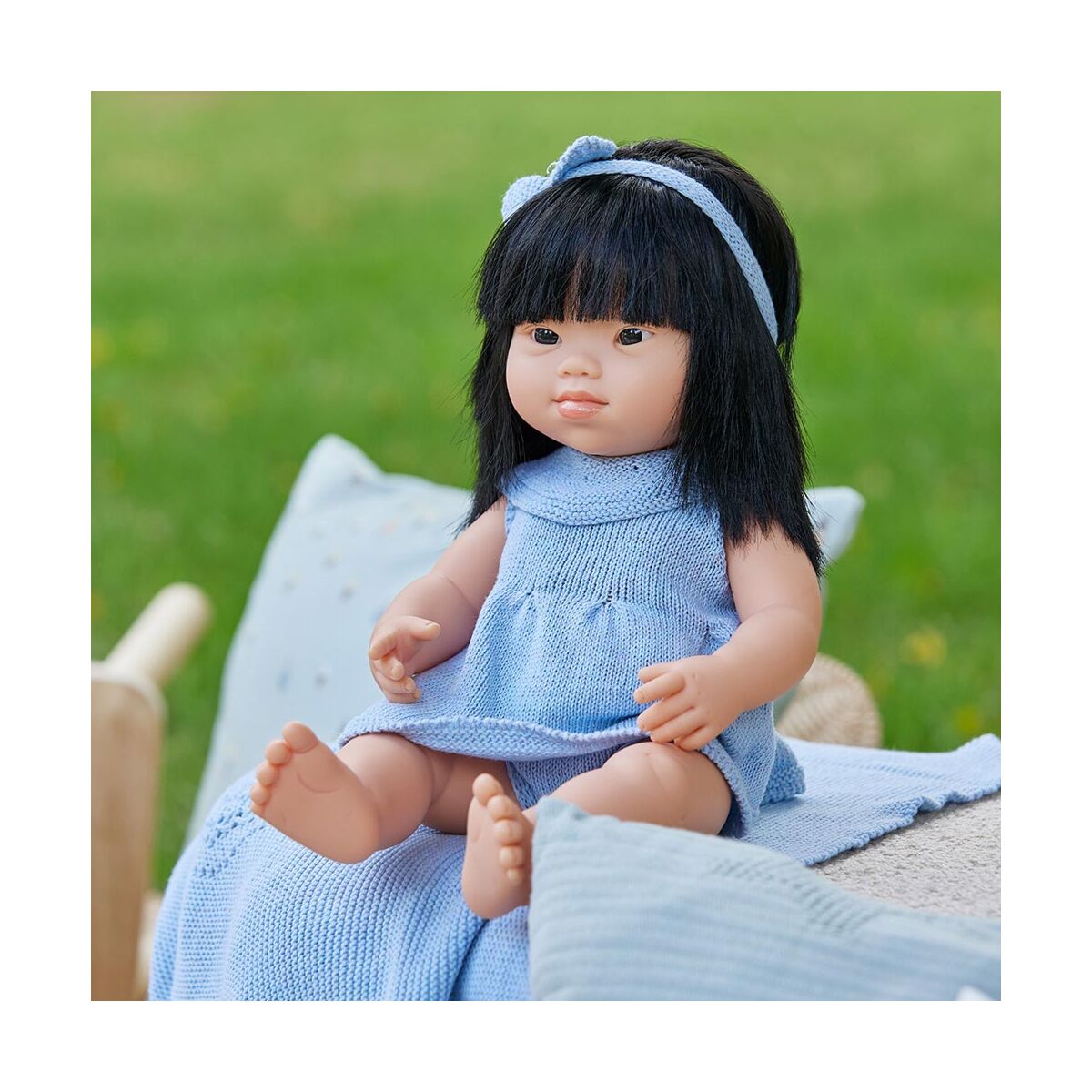 Miniland asian girl doll shop
