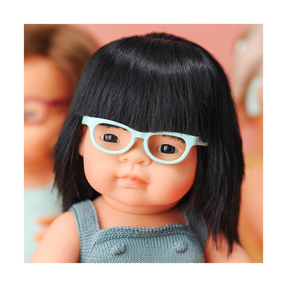 Muñeca con anteojos hot sale